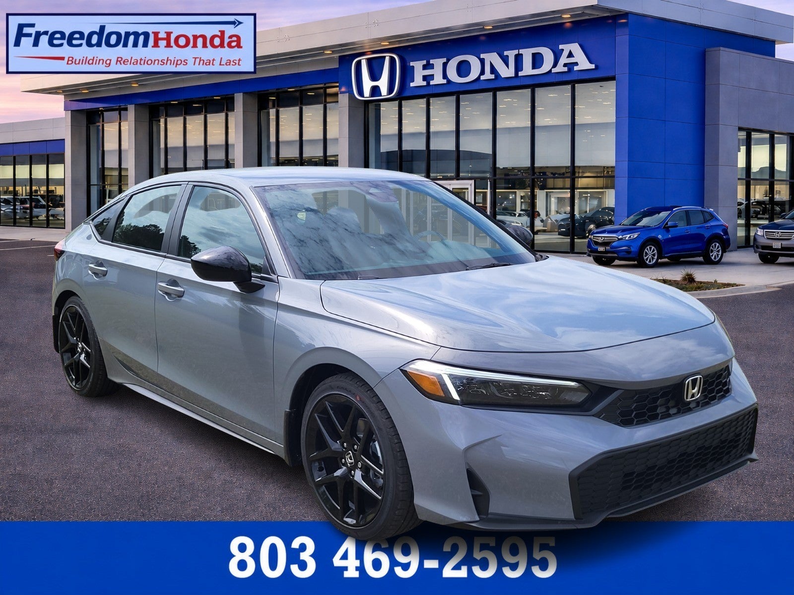 2026 Honda Civic Hatchback Sport in Urban Gray Pearl — front three-quarter view