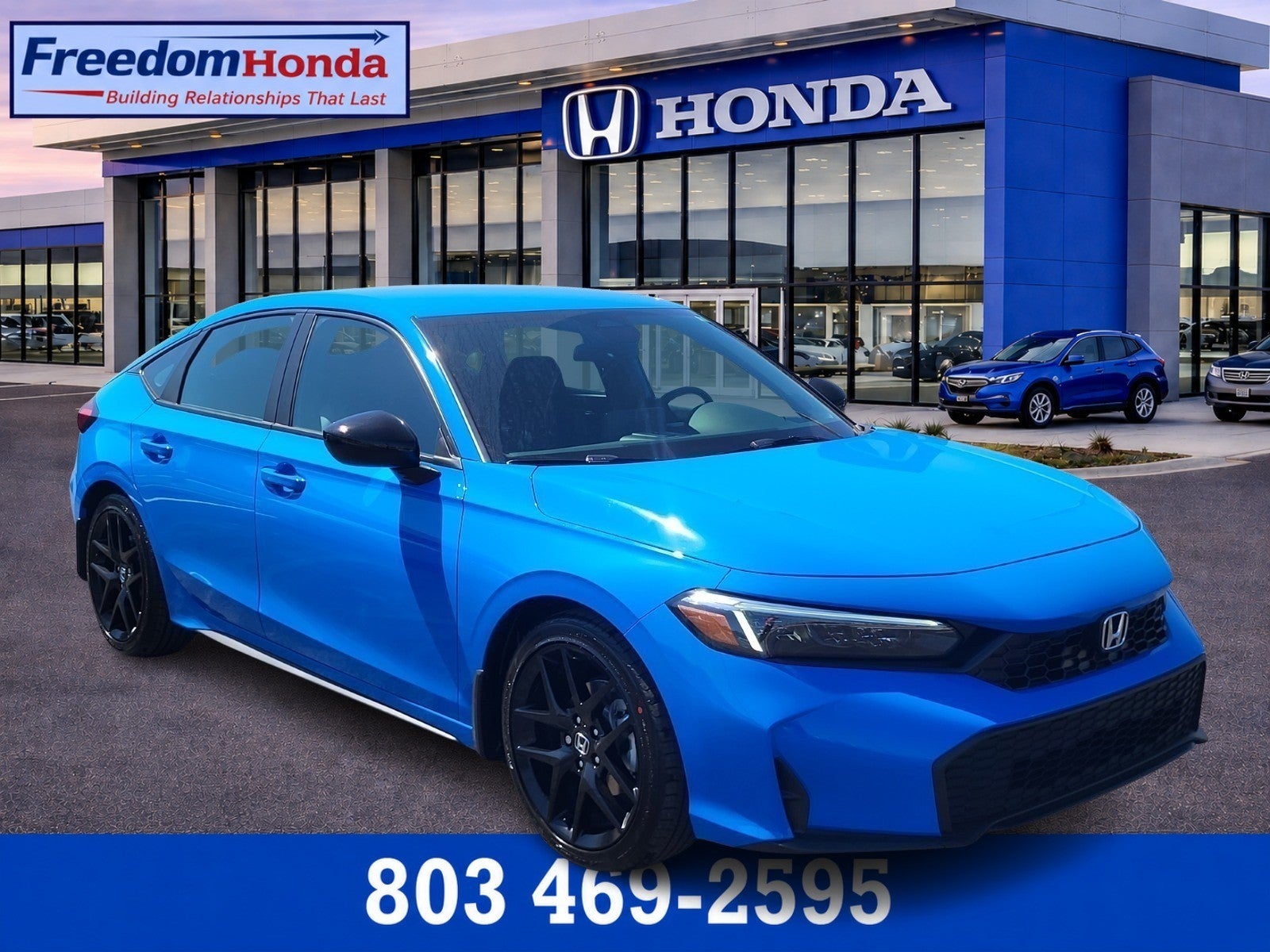 2026 Honda Civic Hatchback Sport in Boost Blue Pearl — front three-quarter view