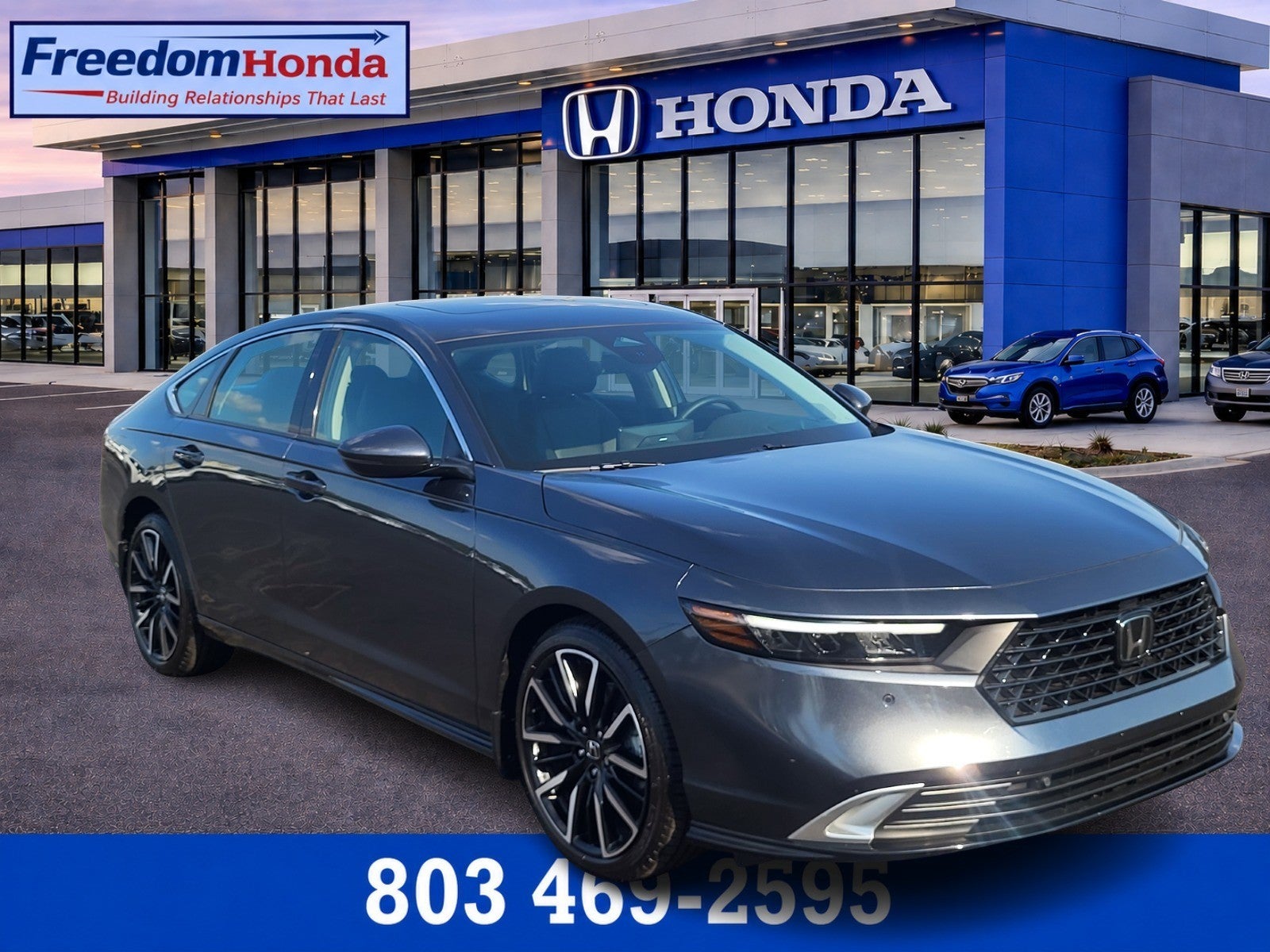 2026 Honda Accord Hybrid Touring in Meteorite Gray Metallic — front three-quarter view
