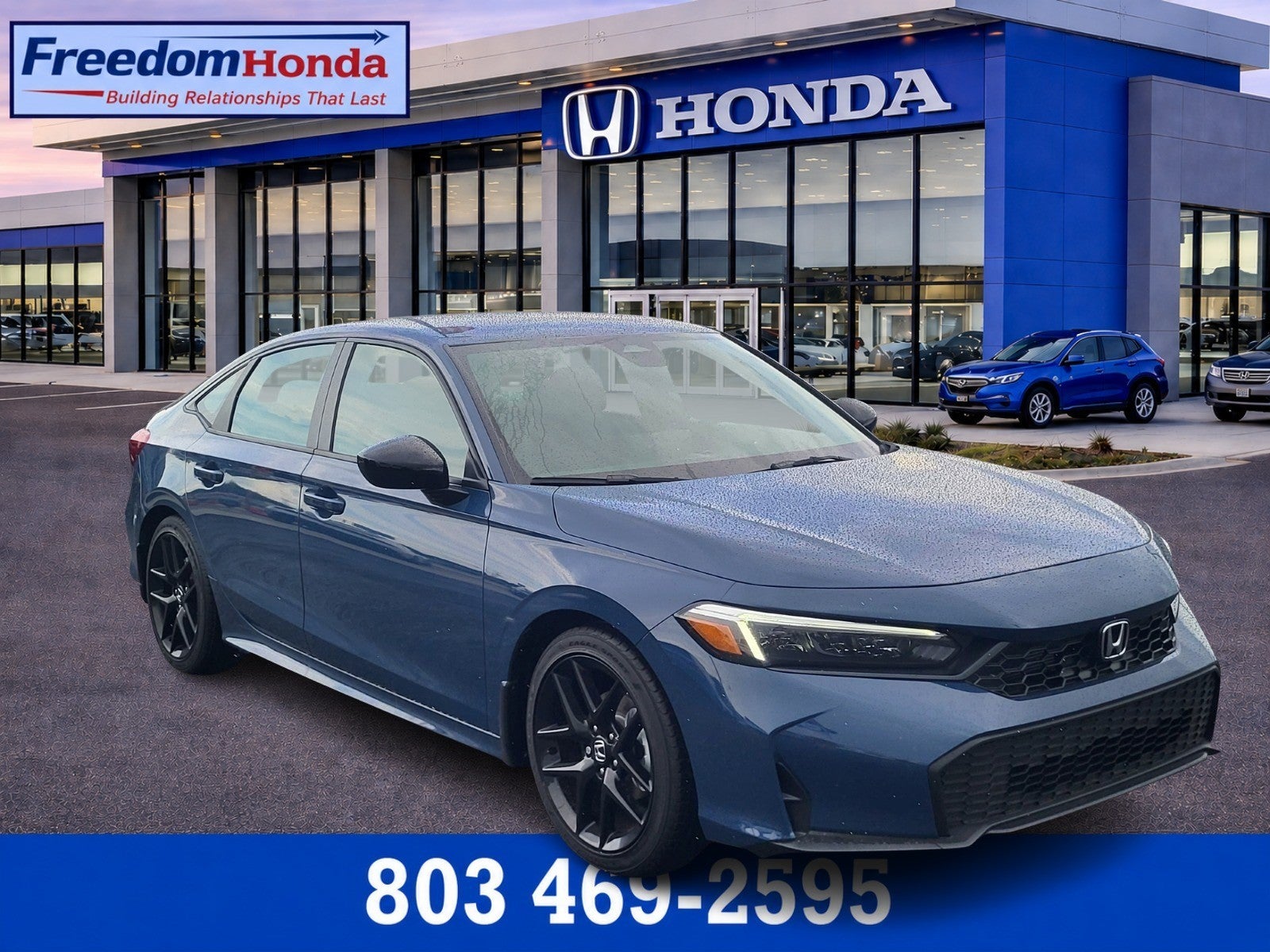 2026 Honda Civic Sedan Sport in Blue Lagoon Pearl — front three-quarter view