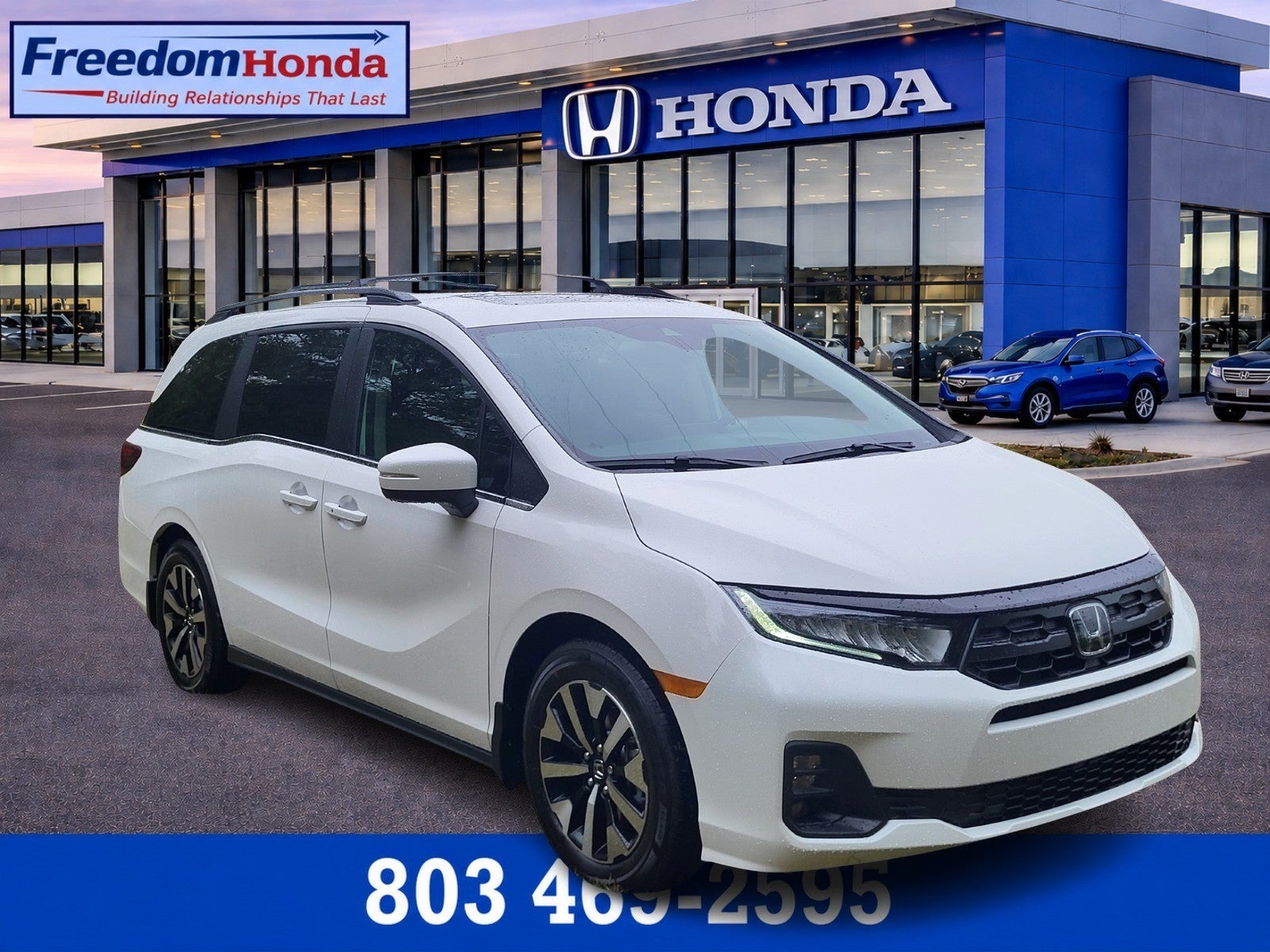 2026 Honda Odyssey EX-L in Platinum White Pearl — front three-quarter view